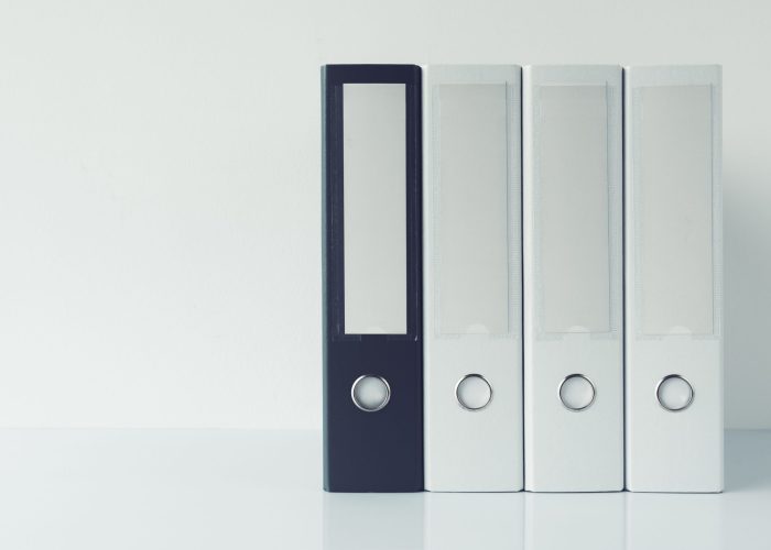 Archival document files ring binder folders in business office